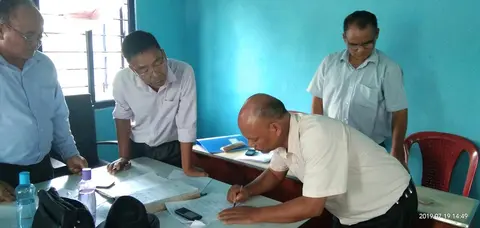 Munpi agreement hiatpitu ah pang Exe. Secy. in sign a bawllai..